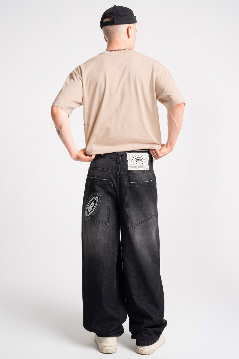 Czarne spodnie jeansowe SKATER