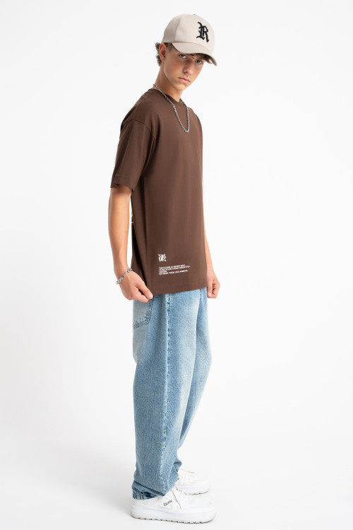 Niebieskie spodnie jeansowe o kroju BAGGY z efektem sprania
