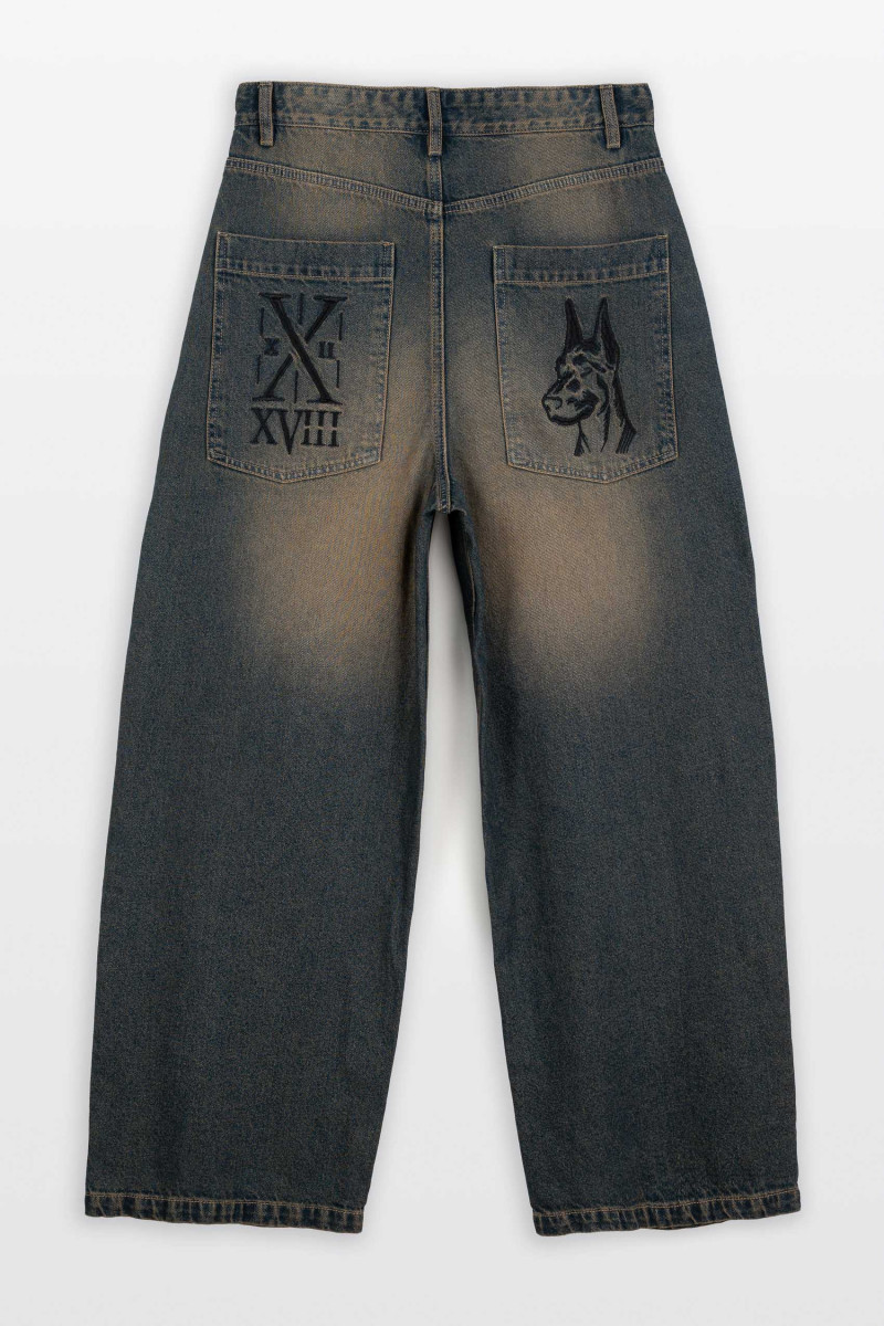 Granatowe spodnie jeansowe o kroju BAGGY z efektem sprania od Reporter